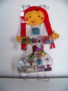 Acrylic sculpture incorporating squares decorated by homeschooled students