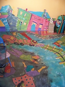 The train running through the front room at The Left Bank Studio