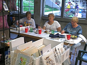 Painting table at the 2014 Iowa State Fair booth