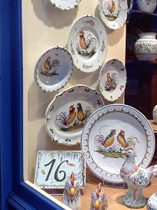 Plates and other ceramic ware painted with French roosters