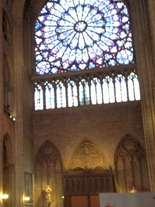Stained-glass rose window viewed from inside Notre-Dame Cathedral, Paris