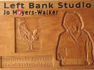 Carved wood plaque by Bob Clymer