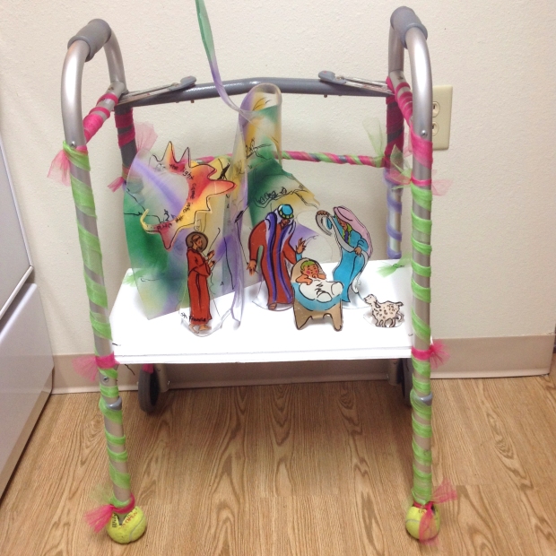 Walker decorated for Christmas, with painted acrylic nativity scene made by Jo Myers-Walker