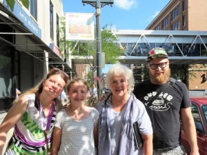 Jo Myers-Walker with family members at reveal of artwork installed on Cedar Rapids skywalk