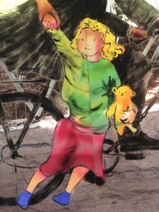 Detail of Cedar Rapids skywalk sculpture, small girl with teddy bear