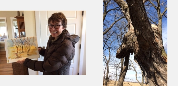 Artist showing watercolor painting of trees; a tree's shape suggests a dragon
