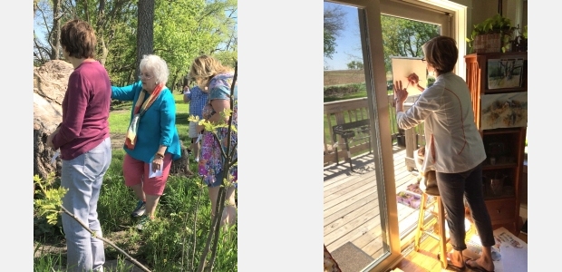 Artists at a workshop near Nevada, Iowa, looking for subjects in nature to paint