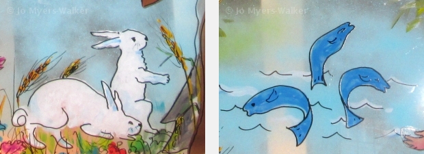 Details from the Canticle sculpture painted by Jo Myers-Walker with legends of St. Francis