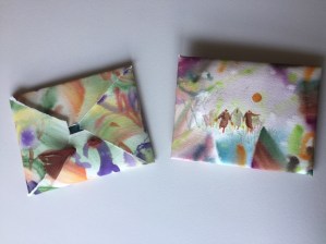 Watercolor paper hand painted to make pouches to bundle notecards