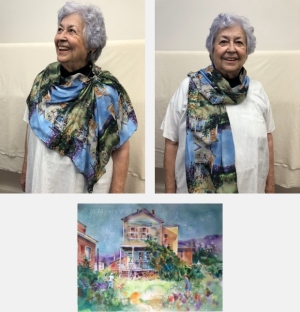 Model wearing scarf printed with watercolor painting Backyard Chickens by Jo Myers-Walker