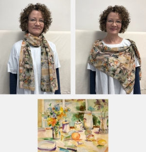 Model wearing scarf printed with watercolor painting Breakfast by Jo Myers-Walker