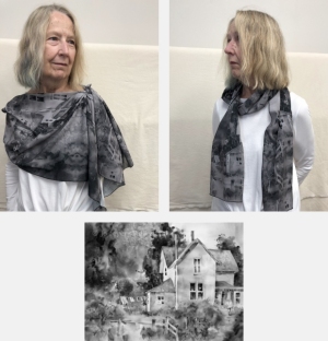 Model wearing scarf printed with greyscale version of watercolor painting Laundry Day by Jo Myers-Walker