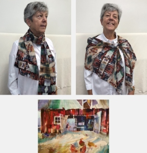 Model wearing scarf printed with images from Red Barn watercolor painting by Jo Myers-Walker