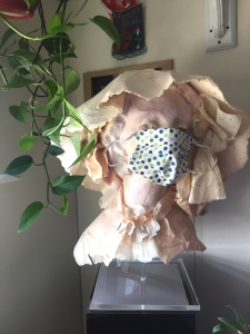 Marisa, handmade paper sculpture of a young woman by artist Jo Myers-Walker