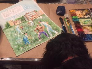 A small dog inspects a watercolor illustration by artist Jo Myers-Walker
