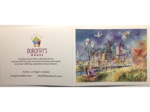 Watercolor painting by artist Jo Myers-Walker with two women flying kites along the Des Moines area waterfront featuring the word "Hope" on one of the kites, on a card to benefit Dorothy's House